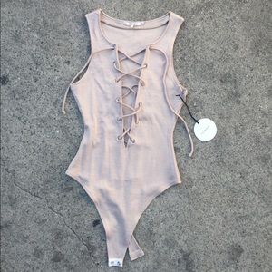 Tularosa tie-up bodysuit In cream